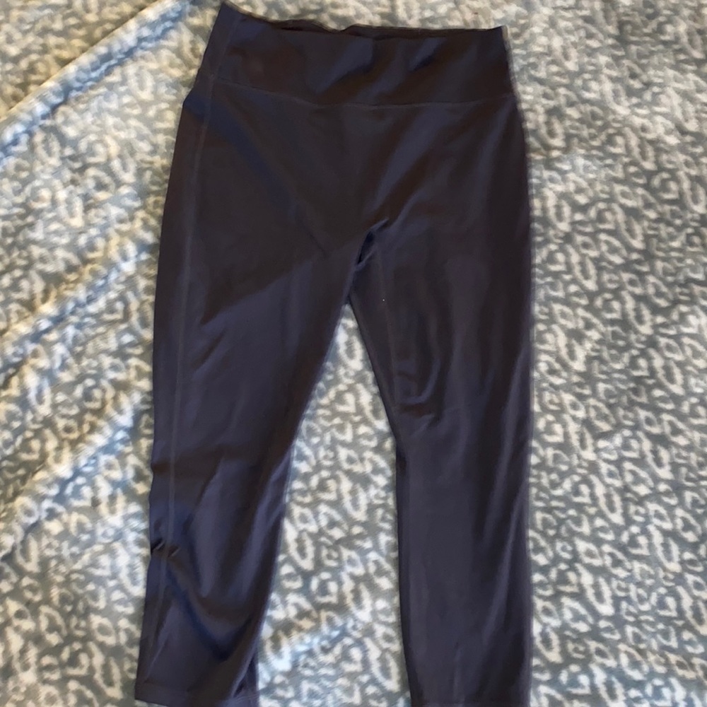 Purple leggings,size medium,brand Fabletics,back pocket